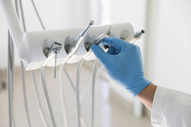 Professional Tooth Extraction technician working in Smithville, TX